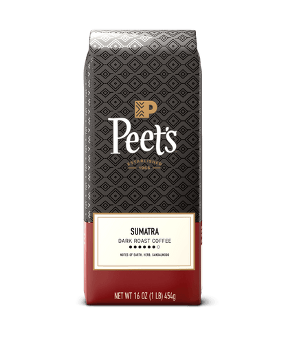 Peet's Sumatra dark roast coffee package on a green background