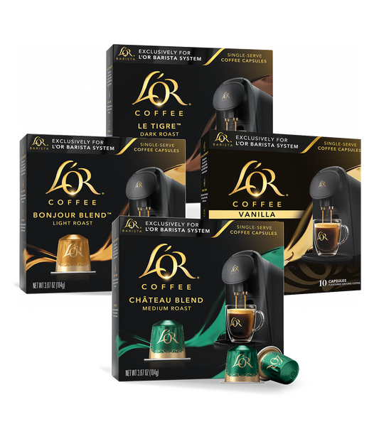 Four boxes of L'OR Coffee capsules with different blends on a white background