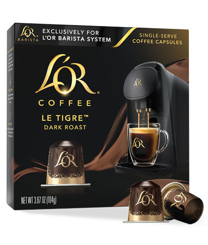 Lér Coffee Le Tigre Dark Roast packaging with coffee machine and cup on a white background